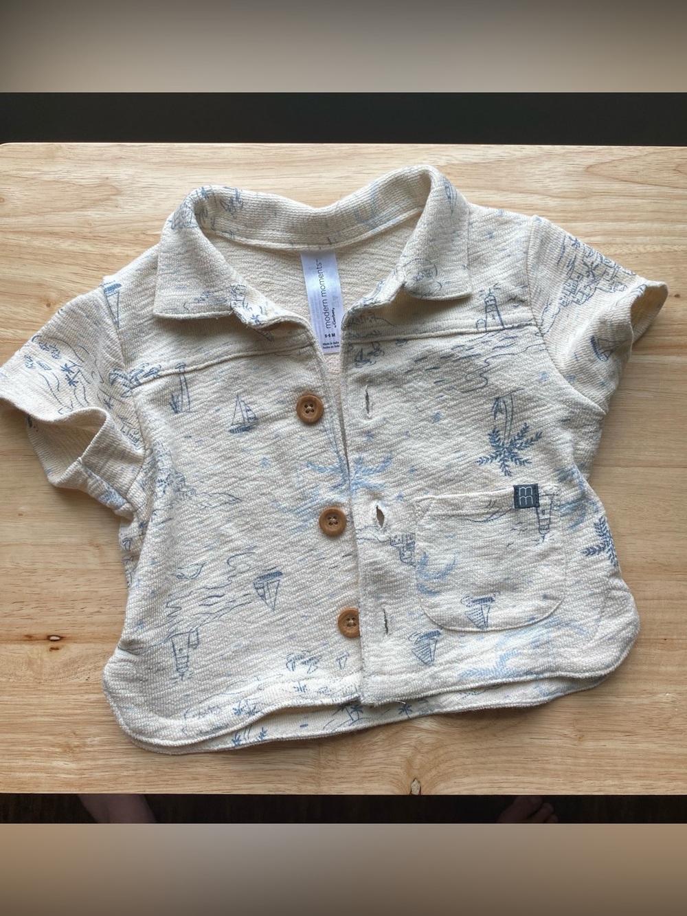 short-sleeve collared cotton shirt with beach print and wood buttons 6-9months
